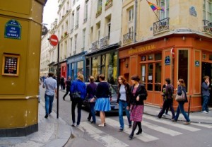 People waling in a typical Paris street, Rue Vieille du Temple